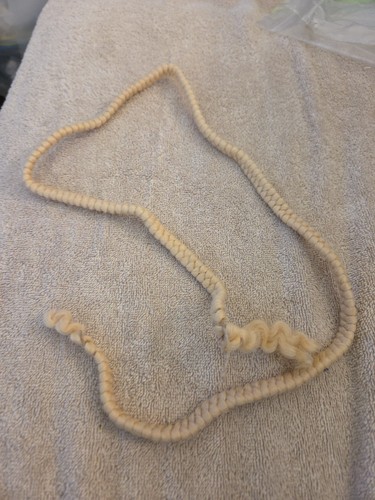 Braid wool doll - wool?,