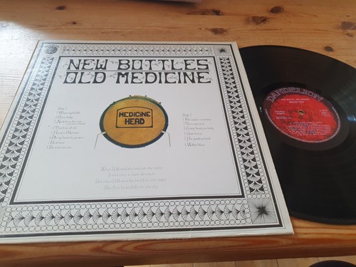 Medicine head new bottles old - new,