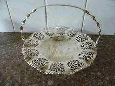 A SCALLOPED EDGE, FRETTED