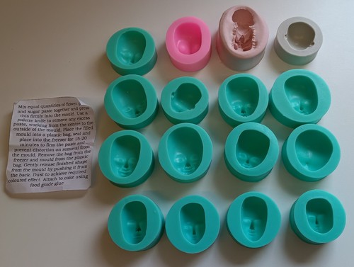 Head and face moulds for - , cake