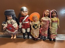 Vintage Collection of 7 Small Plastic Dolls in Costume - Eyes Opening
