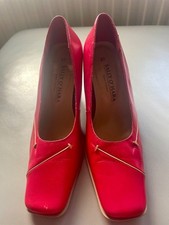 Sally O'Hara red court shoes