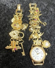Vintage Kirks Folly Moon Phase Watch Women Gold Tone Flower Butterfly Bee Charm