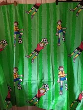 "FOOTBALL" CURTAINS / TIE BACKS.WIDTH = 64" DROP = 55.5".GREEN BACKGROUND.