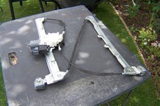 Mitsubishi Colt front passenger door window regulator and motor (2004-2008)