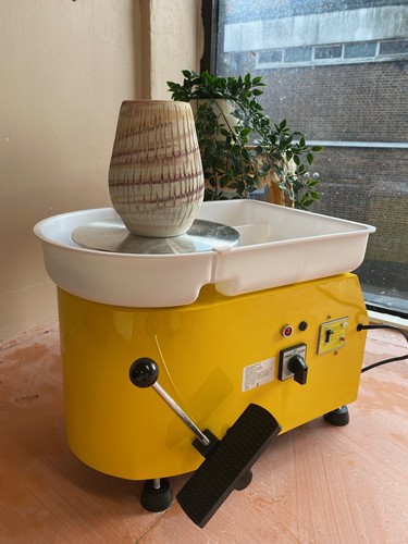Yellow electric pottery wheel - pottery,