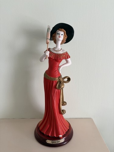 Elegant lady red figurine - lady,