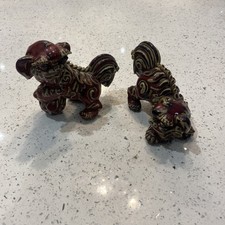 Rare pair of Fu Foo Lion dogs red / plum glazed pottery Chinese Buddhism