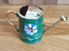 Miniature brass watering can