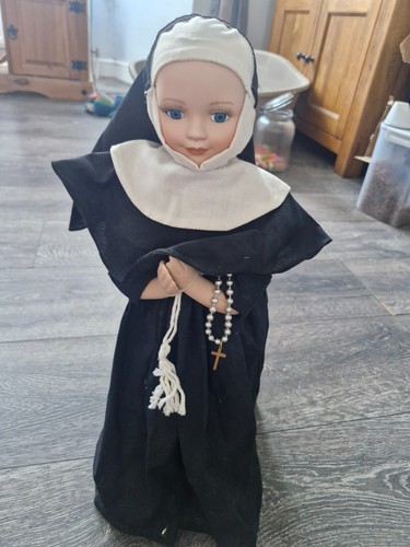 Porcelain doll 1980s - nun, with