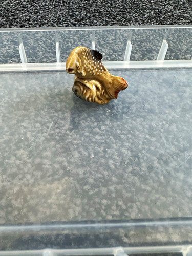 Wade fish figurine hand - wade,