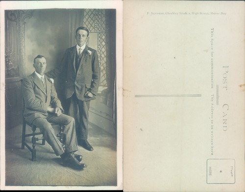 Two men suits scrivens - two,