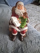 Sitting Santa with Child Figure Christmas Decoration
