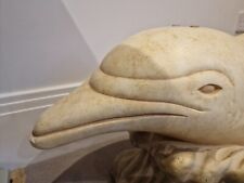 used oval glass coffee table with dolphin base