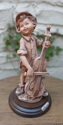 Vintage armani figure boy - g.,