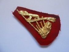 brass pipers trade  badge complete with full  cloth and brass backing plate    B