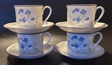 Set of four Royal Doulton Minerva cups and saucers