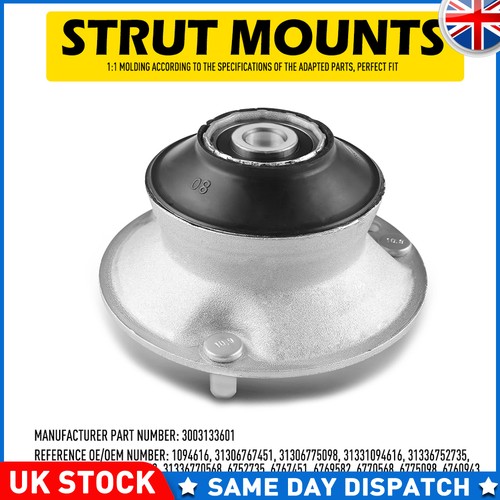 Front strut top shock - front,