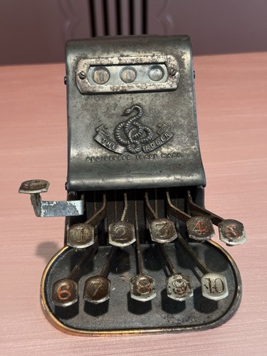 The adder adding machine - the,