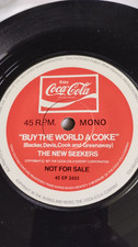 THE NEW SEEKERS - '' BUY THE WORLD A COKE '' COCA COLA - NOT FOR SALE - ENVELOPE