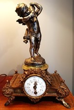 ANTIQUE FRENCH GILT & GREEN ONIX FIGURAL MANTEL CLOCK.