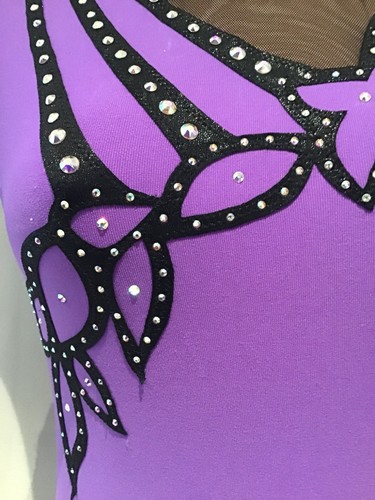 Purple leotard gymnastics age