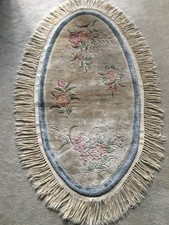 3 Chinese silk rugs used in a