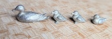 A Family Of 4 Miniature Pewter