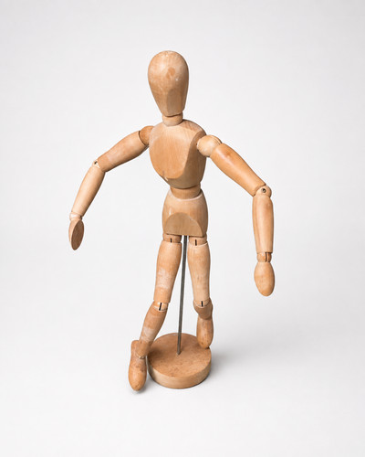 Wooden artist mannequin on - artist’s,