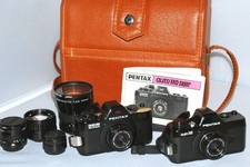 Pentax Auto 110 Super and Auto 110 Film Cameras + 6 Lenses in fitted Pentax case