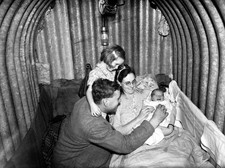 Family inside air raid - inside,