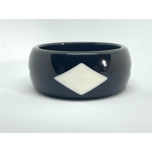 Wide black plastic bangle with