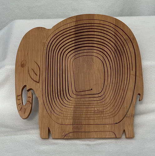 Hand carved folding spiral - carved,