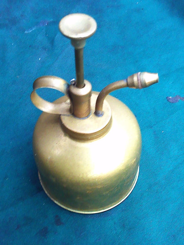 Vintage brass watering can