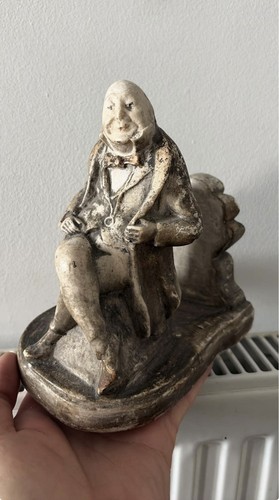 Old figural letter - rack, seated