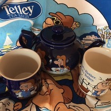 Tetley tea folk collectables - Teapot, Mugs and Tea cloth