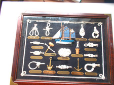 A Large Slection Of Various NAUTICAL  Knots Housed In A Wooden Frame