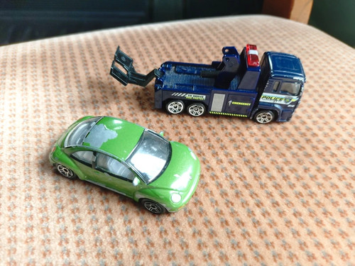Two toy metal - two, cars