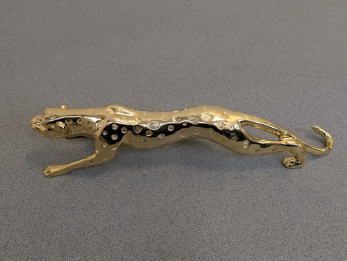 Striking gold cheetah leopard - gold,