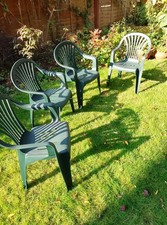 4 green garden chairs, stackable, preowned