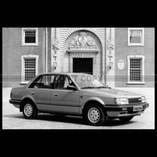 Photo A.030125 Mazda 323 Sedan