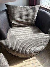 DFS Brown Swivel Chair Cuddle