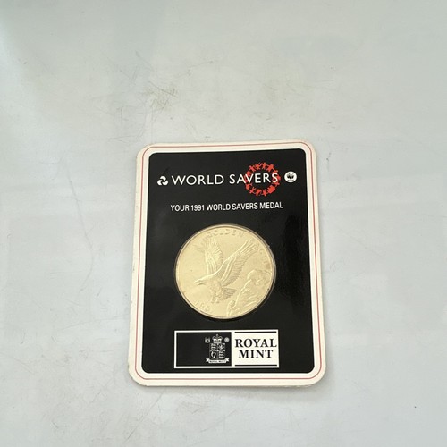 Royal mint world savers medal - mint,