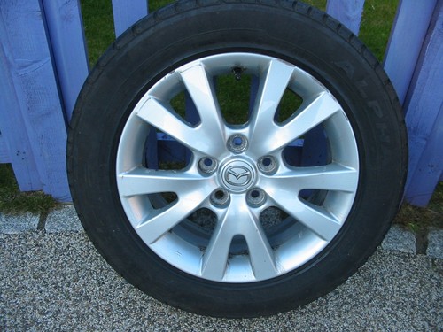 Mazda alloy wheel tyre - &,