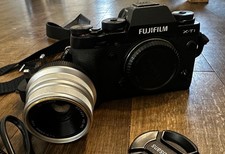 Fujifilm X-T1 mirrorless camera with 7artisan 25mm f1.8 lens, 2 batteries