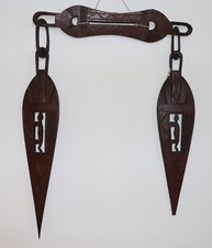 Antique African wooden tribal ceremonial dance paddles on halter