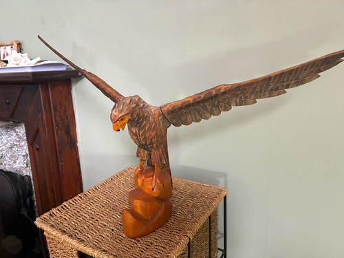 Hand carved wooden eagle - hand,