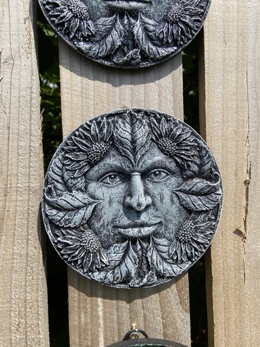 Green man round plaque - man,