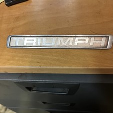 TRIUMPH  BADGE 