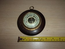 Small round wood barometer